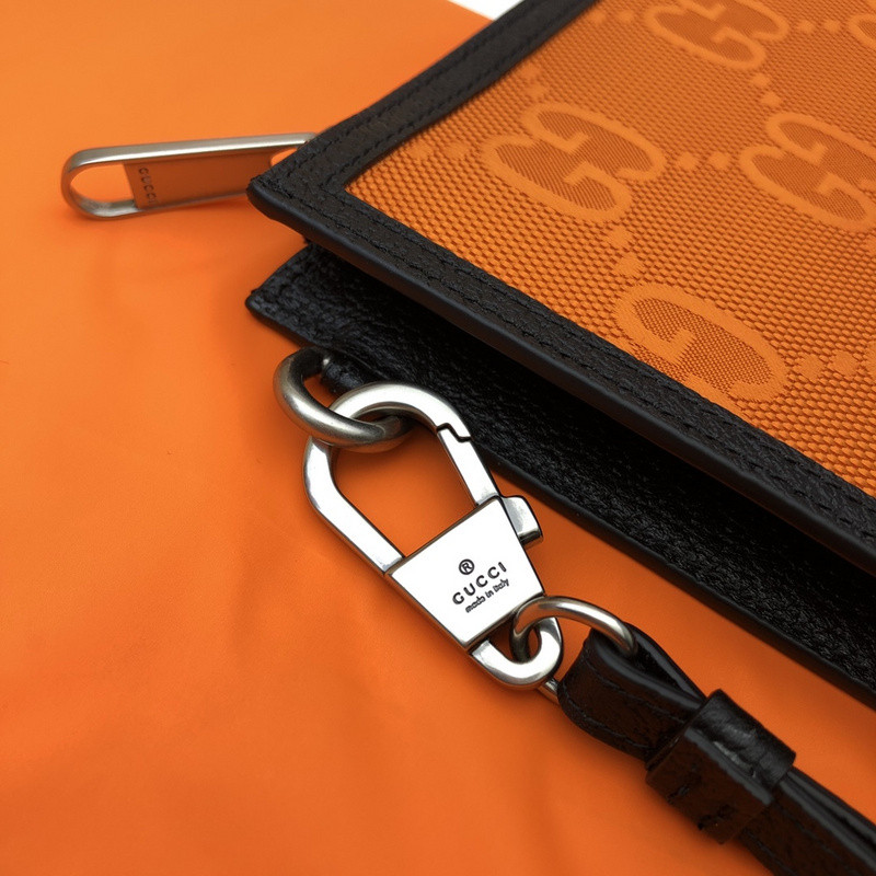 G*u*i clutch bag